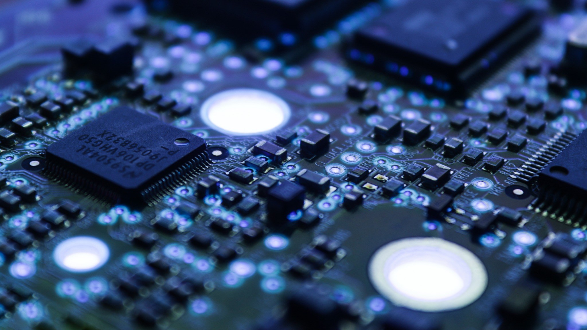 Macro view of embedded processors and components on a printed circuit board